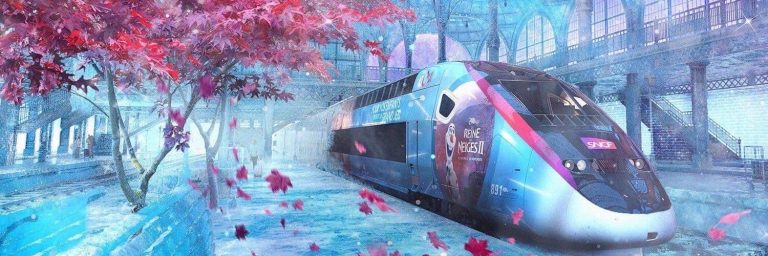 An image of a TGV train traveling through a train station.